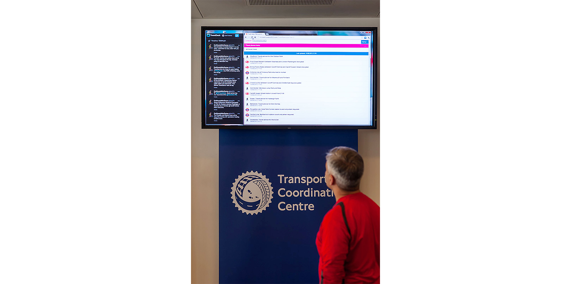 Person looking at TV at the Transportation Coordination Centre